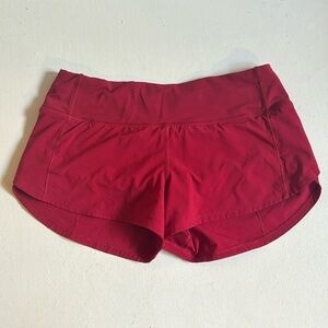 Red Lululemon speed run shorts